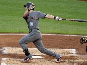 FILE - In this May 30, 2017 file photo Arizona Diamondbacks' Chris Owings drives in a run with a double off Pittsburgh Pirates starting pitcher Ivan Nova in the sixth inning of a baseball game in Pittsburgh. Owings agreed to a $3 million, one-year contract with the Kansas City Royals, five days after the utilityman was cut loose by Arizona. Owings can earn an additional $500,000 in performance bonuses as part of the deal announced Wednesday, Dec. 5, 2018.