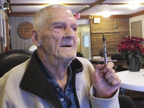 John Flickner, 78, holds his medical marijuana vaporizer inside a Niagara Falls, N.Y., homeless shelter, Friday, Dec. 7, 2018. Although he has a prescription, the wheelchair-bound Flickner was evicted from a federally subsidized housing facility that has a zero-tolerance policy on drugs, highlighting the conflict between state and federal marijuana rules.