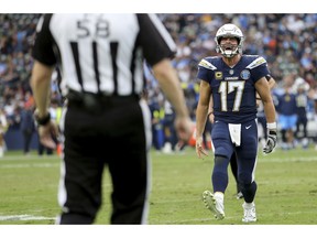 Los Angeles Chargers quarterback Philip Rivers (17) argues with an official in the fourth quarter of an NFL football game against the Cincinnati Bengals, Sunday, Dec. 9, 2018, in Carson, Calif.