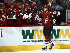 Arizona Coyotes right wing Christian Fischer (36) celebrates his goal against the Washington Capitals during the first period of an NHL hockey game Thursday, Dec. 6, 2018, in Glendale, Ariz.