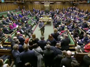 Lloyd Russell-Moyle picking up the five-foot long mace in Parliament.