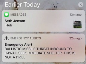 This smartphone screen capture shows a false incoming ballistic missile emergency alert sent from the Hawaii Emergency Management Agency system on Saturday, Jan. 13, 2018. Almost a year after a false ballistic missile alert terrified Hawaii, Canada is "finalizing" a protocol for notifying the public of a genuine airborne threat of mass destruction.