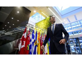 Finance Minister Bill Morneau makes his way to a meeting with his provincial and territorial counterparts in Ottawa on Monday, Dec. 10, 2018.