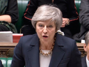 Britain's Prime Minister Theresa May speaks in parliament at the start of a five-day debate on the Brexit European Union Withdrawal Agreement, Dec. 4, 2018.
