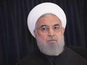 FILE - In this Sept. 26, 2018, file photo, Iranian President Hassan Rouhani speaks during a news conference in New York. President Rouhani is warning Western countries that they will face a massive influx of drugs if Iran becomes weakened by U.S. sanctions. Rouhani spoke in Tehran on Saturday, Dec. 8, 2018, at a six-nation conference on fighting terrorism attended by parliament speakers of Afghanistan, Iran, Pakistan, Turkey, China and Russia.