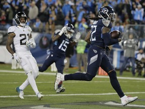 Tennessee Titans running back Derrick Henry (22) runs into the end zone for a touchdown against the Jacksonville Jaguars during the second half of an NFL football game, Thursday, Dec. 6, 2018, in Nashville, Tenn.