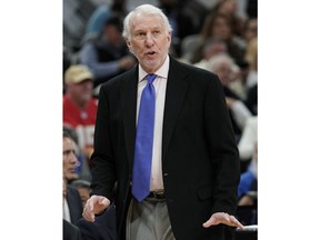 San Antonio Spurs head coach Gregg Popovich signals to his players during the first half of an NBA basketball game against the Utah Jazz, Sunday, Dec. 9, 2018, in San Antonio.