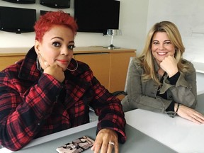 Kim Fields, left, and Lisa Whelchel pose for a photo in Toronto on Thursday, Dec. 6, 2018. Two stars from "The Facts of Life" say they don't have any direct knowledge of a rumoured reboot, but if it were to happen, it would need to capture the same "lightning in a bottle" of the beloved 1980s sitcom.