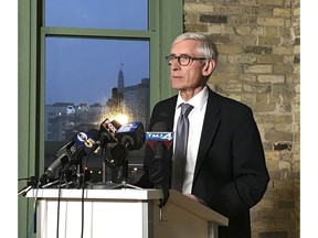 Wisconsin Gov.-elect Tony Evers speaks at the Ward 4 building in Milwaukee on Sunday, Dec. 2, 2018. Democrats in Wisconsin girded for a fight and encouraged voters to speak out as Republicans prepared to move ahead quickly this week with a highly unusual and sweeping lame-duck session to pass a series of proposals that would weaken both Democratic Gov.-elect Evers and Attorney General-elect Josh Kaul.