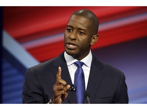 In this Oct. 21, 2018 file photo, Florida Democratic gubernatorial candidate Andrew Gillum speaks during a CNN debate against his Republican opponent Ron DeSantis in Tampa, Fla. Gillum is set to address top Democratic Party donors gathered Tuesday in Washington amid speculation that he's considering a 2020 presidential bid. The Tallahassee mayor is fresh off a close loss in the Florida governor's race. Party officials confirmed Gillum is the surprise speaker at a closed gathering of about 300 donors huddling in a Washington hotel.