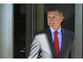 FILE - In this July 10, 2018 file photo, former Trump national security adviser Michael Flynn leaves federal courthouse in Washington, following a status hearing.