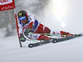 Austria's Marcel Hirscher speeds down the course on his way to win a men's World Cup giant slalom in Val D'Isere, France, Saturday, Dec. 8, 2018.