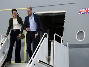 Britain's Prince William and his wife Kate, the Duchess of Cambridge, arrive at the Akrotiri Royal Air Force base, near the south coastal city of Limassol, Cyprus, Wednesday, Dec. 5, 2018. The RAF Akrotiri is the home of the Cyprus Operations Support Unit which supplies support to operations in the region to protect the UK's strategic interests.