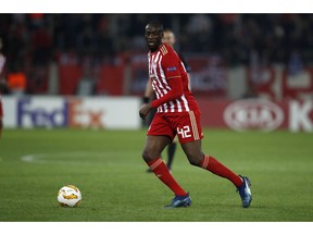 FILE - In this Thursday, Nov. 8, 2018 file photo, Olympiakos' Yaya Toure controls the ball during a Group F Europa League soccer match against Dudelange at Georgios Karaiskakis stadium in the port of Piraeus, near Athens. Former Barcelona and Manchester City midfielder Yaya Toure has left Olympiakos following a disappointing return to the Greek club.  The four-time African Footballer of the Year officially left Olympiakos Tuesday, Dec. 11, the club announcing that the two sides had "mutually agreed to end their cooperation."