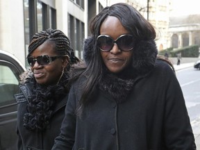 Fiona Onasanya, right, arrives for sentencing at the Old Bailey, London, Tuesday, Jan. 29, 2019.