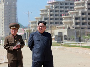 In this undated file photo provided on Saturday, May 26, 2018, by the North Korean government, North Korean leader Kim Jong Un inspects the construction site of the Wonsan-Kalma coastal tourist area in Gangwon-do, North Korea.