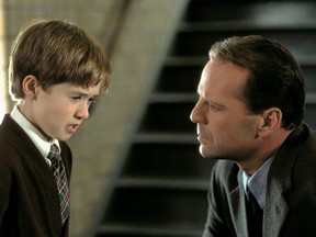 Haley Joel Osment, Bruce Willis in The Sixth Sense.
