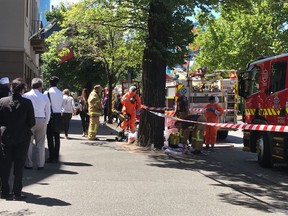Hazmat and fire crews work outside the Indian and French Consulate in Melbourne, Australia Wednesday, Jan. 9, 2019. At least seven international consulates were evacuated in Melbourne, Australia, on Wednesday after reports that multiple suspicious packages had been sent to them.