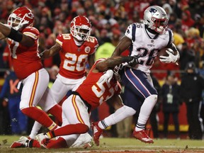 New England Patriots running back Sony Michel (26) runs to the end zone for a touchdown during the first half of the AFC Championship NFL football game against the Kansas City Chiefs, Sunday, Jan. 20, 2019, in Kansas City, Mo.