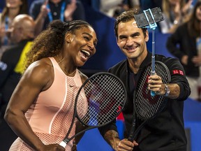 Serena Williams and Roger Federer of Switzerland take a selfie following their mixed doubles match on day four of the Hopman Cup tennis tournament in Perth January 1, 2019.