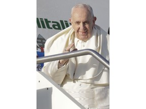 Pope Francis boards an airplane on his way to Panama, at Rome's Fiumicino international airport, Wednesday, Jan. 23, 2019. History's first Latin American pope is the son of Italian immigrants to Argentina and is expected to offer words of hope to young people gathered in Panama for World Youth Day.
