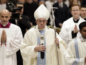 Pope Francis leaves after celebrating a new year Mass in St. Peter's Basilica at the Vatican, Tuesday, Jan. 1, 2019. Francis celebrated Mass Tuesday in St. Peter's Basilica to formally open 2019. In his homily Francis urged Catholics to allow themselves to be led again as children are led by their mothers.