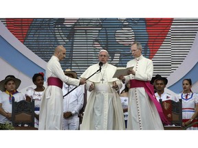 Pope Francis reads during the Way of the Cross, at Campo Santa Maria La Antigua on the occasion of the World Youth Day, in Panama City, Panama, Friday, Jan. 25, 2019.