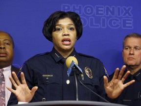 Joined by other police officials and city leaders, Phoenix Police Chief Jeri Williams announces the arrest of Nathan Sutherland, a licensed practical nurse, on one count of sexual assault and one count of vulnerable adult abuse on an incapacitated woman who gave birth last month at a long-term health care facility Wednesday, Jan. 23, 2019, in Phoenix. Sutherland was one of the woman's caregivers at the Hacienda HealthCare facility and he was charged after authorities obtained a court order to take a DNA sample from him, which was compared to DNA of the baby boy, according to police.