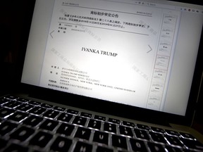 FILE - In this Nov. 6, 2018, file photo, a document from the website of China's Trademark Office of the State Administration for Industry and Commerce showing provisional approval of a trademark for Ivanka Trump Marks LLC is seen on a computer screen in Beijing. China has greenlighted five more Ivanka Trump trademarks as trade talks with her father's administration intensify. They cover a range from wedding dresses to insurance and art valuation services.