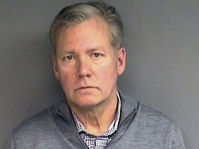This booking photograph released Wednesday, Jan. 16, 2019, by the Stamford, Conn., Police Department shows Chris Hansen, former host of the television program "To Catch a Predator," arrested Monday in his hometown of Stamford, on charges he he wrote bad checks for $13,000 worth of marketing materials. (Stamford Police Department via AP)