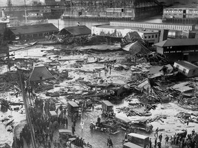FILE - In this Jan. 15, 1919, file photo, the ruins of tanks containing more than 2 million gallons of molasses lie in a heap after erupting along the waterfront in Boston's North End neighborhood. Several buildings were flattened in the disaster, which killed 21 people and injured 150 others. (AP Photo/File)