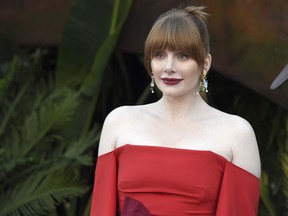 FILE -- In this Tuesday, June 12, 2018 file photo actor Bryce Dallas Howard arrives at the Los Angeles premiere of "Jurassic World: Fallen Kingdom" at the Walt Disney Concert Hall. Howard, an actor, producer and director, has been named 2019 Woman of the Year by Harvard University's Hasty Pudding Theatricals student group.