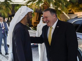 Abu Dhabi's Crown Prince Sheikh Mohammed bin Zayed Al Nahyan greets  visiting US Secretary of State Mike Pompeo prior to their meeting at Al-Shati Palace in the UAE capital Abu Dhabi on Saturday, Jan. 12, 2019.