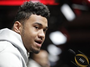 Alabama's Tua Tagovailoa answers questions during media day for the NCAA college football playoff championship game Saturday, Jan. 5, 2019, in Santa Clara, Calif.