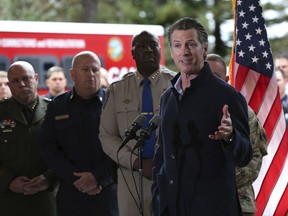Gov. Gavin Newsom discusses emergency preparedness during a visit to the California Department of Forestry and Fire Protection CalFire Colfax Station Tuesday, Jan. 8, 2019, in Colfax, Calif. On his first full day as governor, Newsom announced executive actions to improve the state's response to wildfires and other emergencies.
