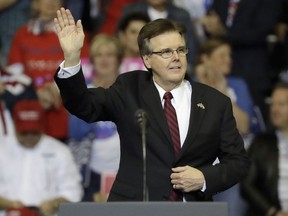 FILE - In this Oct. 22, 2018, file photo, Texas Lt. Gov. Dan Patrick speaks during a campaign rally in Houston. Patrick has been called away from his duties overseeing the opening of the state's legislative session for a meeting at the White House. Patrick headed Donald Trump's 2016 campaign in Texas and his trip to Washington comes as the president prepares to address the nation on the partial government shutdown sparked by a fight over funding for a U.S.-Mexico border wall.