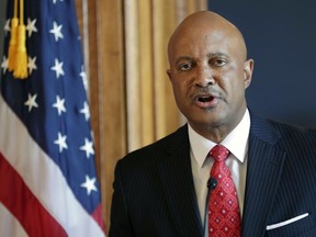 FILE - In this July 9, 2018, file photo, Indiana Attorney General Curtis Hill speaks during a news conference at the Statehouse in Indianapolis. Democratic Rep. Mara Candelaria Reardon, of Munster, announced Friday, Jan. 11, 2019, a bill proposing a 12-member oversight commission with the power to oust the attorney general for sexual misconduct.  Reardon says she was groped at a bar by Hill and wants to make it easier to remove some state officeholders.