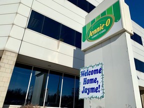 FILE - In this Jan. 16, 2019 file photo, a "Welcome Home, Jayme!" sign is shown in front of the Jennie-O Turkey Store in Barron, Wis., where her parents, James and Denise Closs, worked. Hormel Foods and Jennie-O say they'll donate the $25,000 it had offered in reward money for information leading to Jayme Closs directly to the 13-year-old girl. Jayme was kidnapped from her home in Barron, Wisconsin, on Oct. 15 and both of her parents were killed. . She escaped 88 days later. Twenty-one -year-old Jake Patterson is charged with kidnapping and homicide.