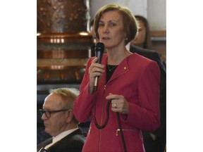 FILE - In this March 15, 2018 file photo, Kansas state Sen. Barbara Bollier, R-Mission Hills, speaks during a debate at the Statehouse in Topeka, Kan. Democrats' gains in state legislatures didn't end with last November's elections. As the 2019 legislative sessions get underway, Democrats continue to add to their numbers thanks to defections from GOP lawmakers. So far this month, Republicans in California, Kansas and New Jersey have switched party affiliation and become Democrats. While the specific reasons vary, the party-flippers have one thing in common: They say the GOP has become too extreme under President Donald Trump.