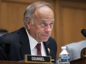 FILE - In this June 8, 2018, file photo, U.S. Rep. Steve King, R-Iowa, listens during a hearing on Capitol Hill in Washington. On Tuesday, Jan. 15, 2019, the House voted 416-1 for a resolution repudiating King's words expressing puzzlement about why terms like "white nationalist" are offensive.