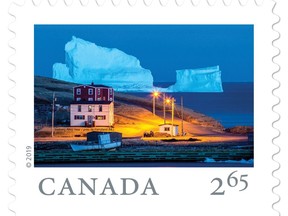The towering iceberg that captured international attention in 2017 when it floated by a tiny Newfoundland town will be seen around the world again, this time featured on an international stamp, shown in a handout from Canada Post. St. John's photographer Michael Winsor captured a striking image of the giant iceberg dwarfing the shoreline of the aptly-named Iceberg Alley. THE CANADIAN PRESS/HO-Canada Post MANDATORY CREDIT