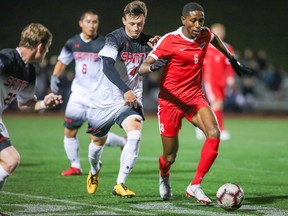 Simon Fraser University soccer player Mamadi Camara (right) is shown in a handout photo. Camara was one of six Canadians invited to the MLS Combine to showcase their skills ahead of Friday's MLS SuperDraft in Chicago.THE CANADIAN PRESS/HO-SFU Athletics-Paul Yates MANDATORY CREDIT