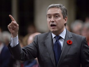 Francois-Philippe Champagne, Minister of Infrastructure and Communities, rises during question period in the House of Commons on Parliament Hill in Ottawa on November 1, 2018. Newly released documents show the design of Liberals' infrastructure program contributed to delays in construction and the flow of federal money. An internal analysis for the first phase of the Liberals' program, for which 32 departments handed out a total of $14.4 billion, noted the focus on small projects bogged down the federal approvals process.