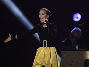 Celine Dion performs at the "Aretha! A Grammy Celebration For The Queen Of Soul" event at the Shrine Auditorium on Sunday, January 13, 2019, in Los Angeles. Dion is pulling a song she recorded with R. Kelly from streaming services in the wake of a Lifetime docuseries that details allegations of sexual misconduct against the R&B singer.THE CANADIAN PRESS/AP-Photo by Richard Shotwell/Invision/AP