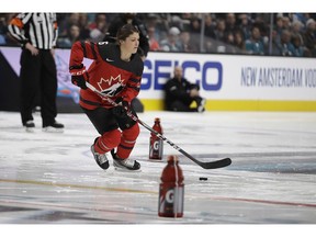 Canada's Rebecca Johnston gives a demonstration of puck control during the Skills Competition, part of the NHL hockey All-Star weekend, in San Jose, Calif., Friday, Jan. 25, 2019. What was a public relations move by the NHL turned out to be more than that for women's hockey. Brianna Decker and Johnston, who were among the four women who participated in the NHL all-star skills competition, hope the buzz they created on that stage is a leap forward for their sport and their leagues.