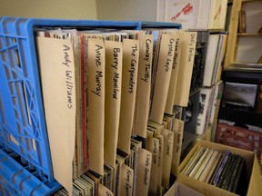 Boxes of vinyl records line the walls at Canada Boy Vinyl, the only vinyl record factory in Canada, at the facility in Calgary on October 22, 2015. One of Canada's largest distributors of vinyl records has shut down with little notice -- leaving some retailers scrambling to find alternate suppliers and raising questions about higher prices. RPM Distribution, based in Concord, Ont., notified its clients by email on Monday that it would be "closing all operations effective immediately." The resurgence of vinyl has seen its share of casualties in recent years, despite the steady upswing in sales. Two years ago Calgary-based player Canada Boy Vinyl, one of the country's only pressing plants, closed down little more than year after it opened.