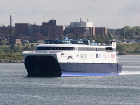The CAT, a high-speed passenger ferry, departs Yarmouth, N.S. heading to Portland, Maine, on its first scheduled trip on June 15, 2016. Nova Scotia is considering footing the bill for U.S. border security agents in Maine serving a Nova Scotia-Maine ferry. Transportation Minister Lloyd Hines says nothing has yet been decided in talks with U.S. officials, but it could be part of the cost of doing business as the Yarmouth, N.S.-based ferry moves to a new entry point.