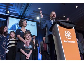 Ryan Meili, right, speaks after being elected party leader, while his partner Mahli Brindamour, left, looks on at the Saskatchewan New Democrats leadership convention in Regina on March 3, 2018. The Saskatchewan NDP says it's time to review how potash royalties are structured. The Johnson Shoyama Graduate School of Public Policy recently published a report on the province's tax regime saying since 2009 the effective tax rates on potash profits have averaged 6.9 percent compared with 9.5 in the early 2000's. Leader Ryan Meili says this equals about 40 to 100 million dollars per year in lost revenue, which is a substantial part of the revenue loss.