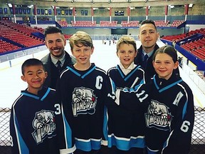 Vancouver Minor Hockey Asssociation's PeeWee A2, "The Spirit" team members from left, assistant captain Isaac, assistant coach Connor, captain Jordan, assistant captain Waylon, coach Stephen Gillis, and assistant captain Paige are seen in this undated handout photo. A Vancouver peewee hockey coach says he's "amazed and overwhelmed" by the response to a video put together by his team to help him find a living kidney donor. Stephen Gillis said the video is the nicest thing that anyone has ever done for him.