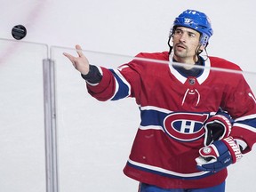 Montreal Canadiens' Tomas Plekanec throws a puck to fans following his 1000th NHL hockey game against the Detroit Red Wings in Montreal on October 15, 2018. Former Montreal Canadiens centre Tomas Plekanec has filed a court action in an effort to recover $200,000 he provided to help finance a movie starring his wife. Court documents filed last week say "The Perfect Kiss", with an estimated budget of $1.7 million, was released in the United States last March and in Canada and his native Czech Republic last November. The movie, which was filmed in the Montreal suburb of Laval, is a romantic comedy starring Lucie Vondrackova as a single 30-year-old woman who pretends to be married with children to escape the unwanted attention of her overbearing parents.